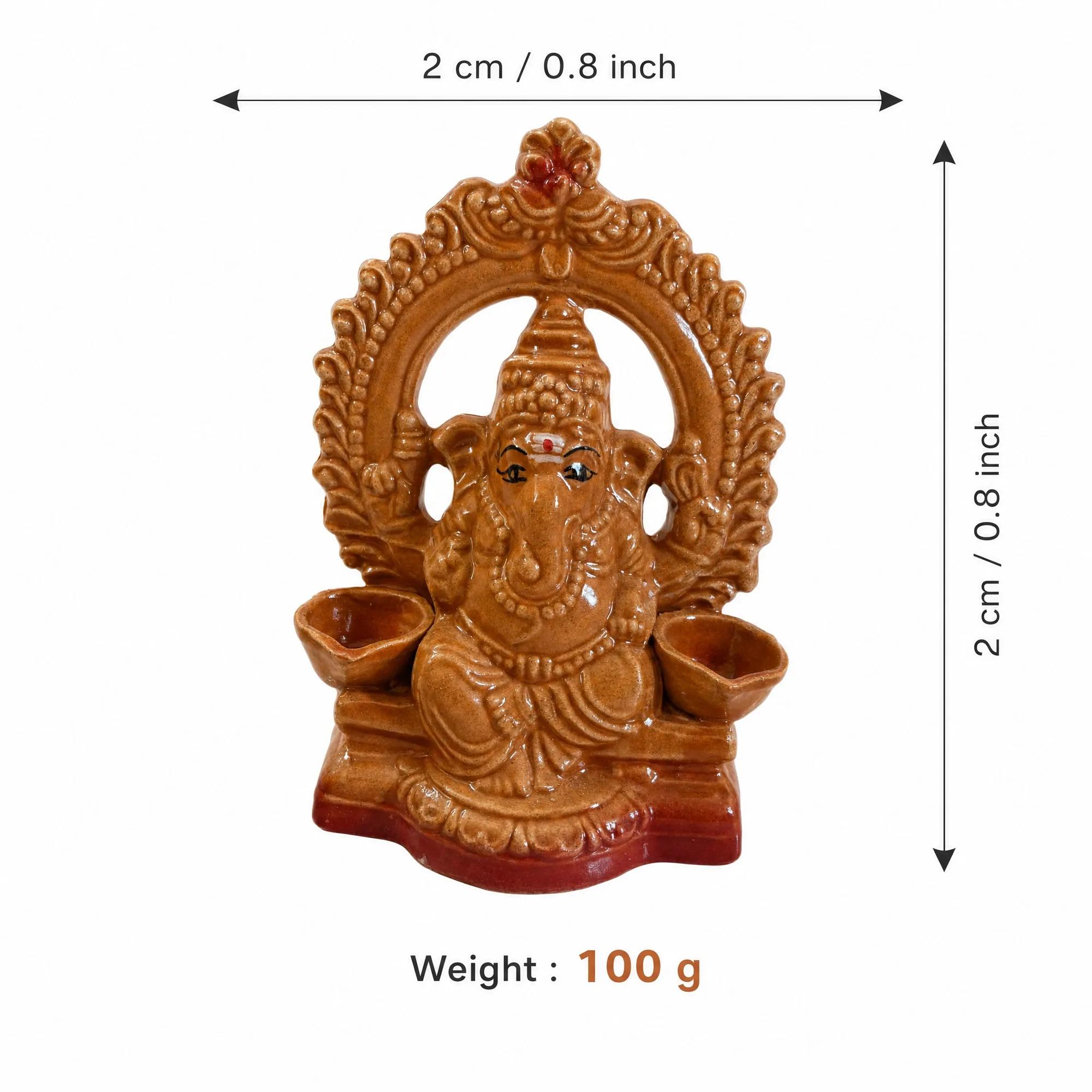 Diagram illustrating the dimensions (2 cm / 0.8 inch width and height) and weight (100 g) of the ceramic Ganesha idol.