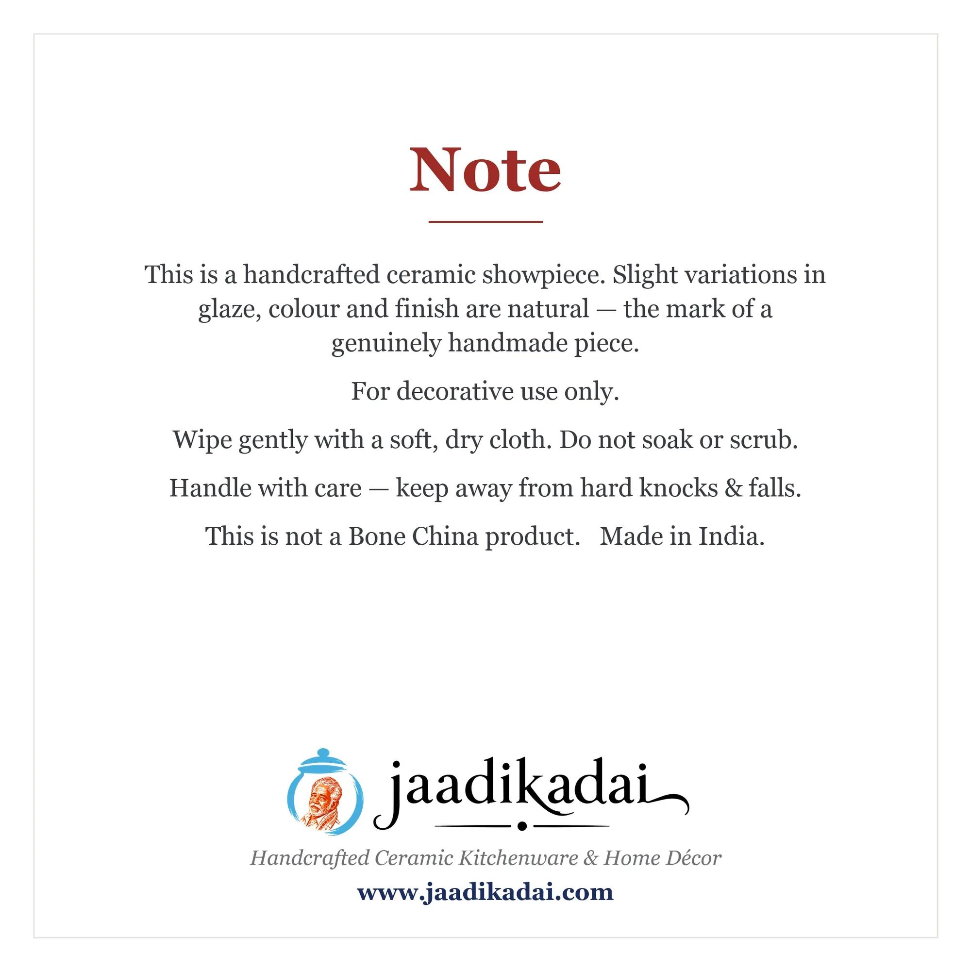Important care instructions and brand information for the ceramic love birds parrot showpiece.