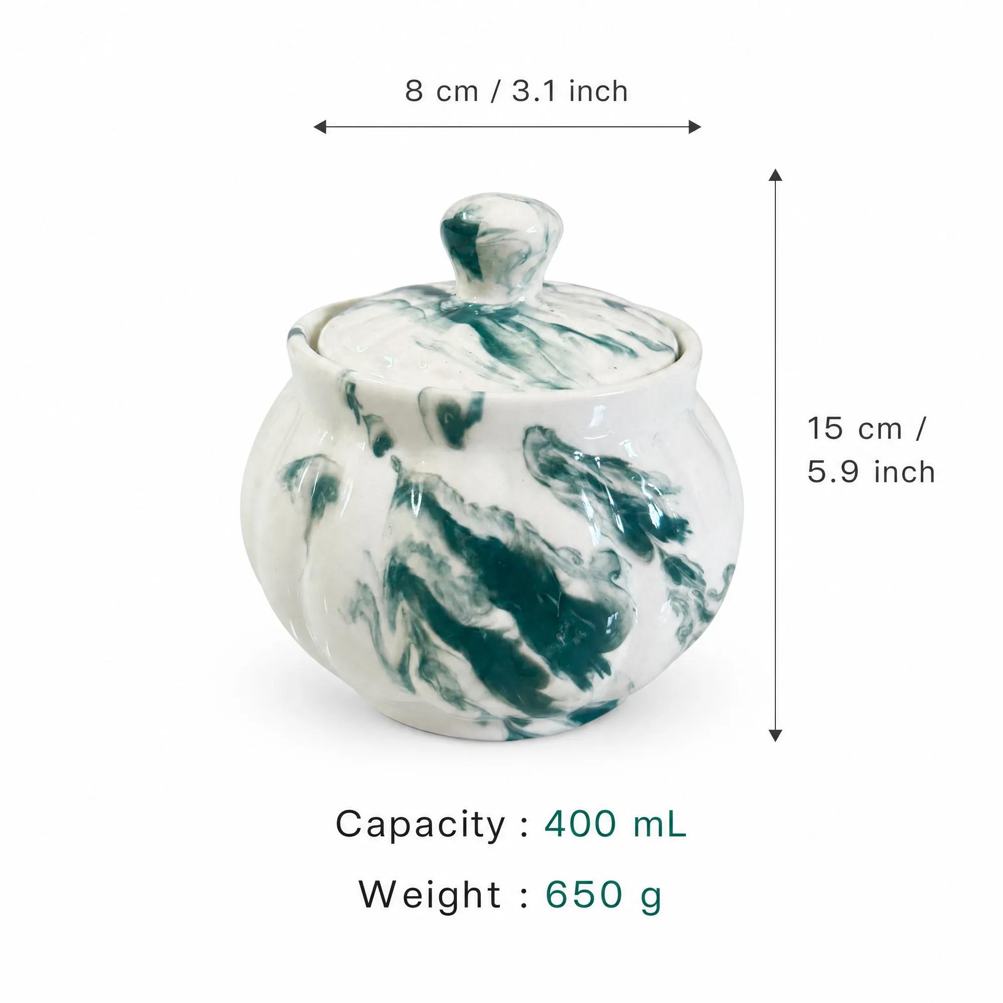 The green swirl ceramic pot with overlaid text indicating its 400ml capacity and 15cm x 8cm dimensions.