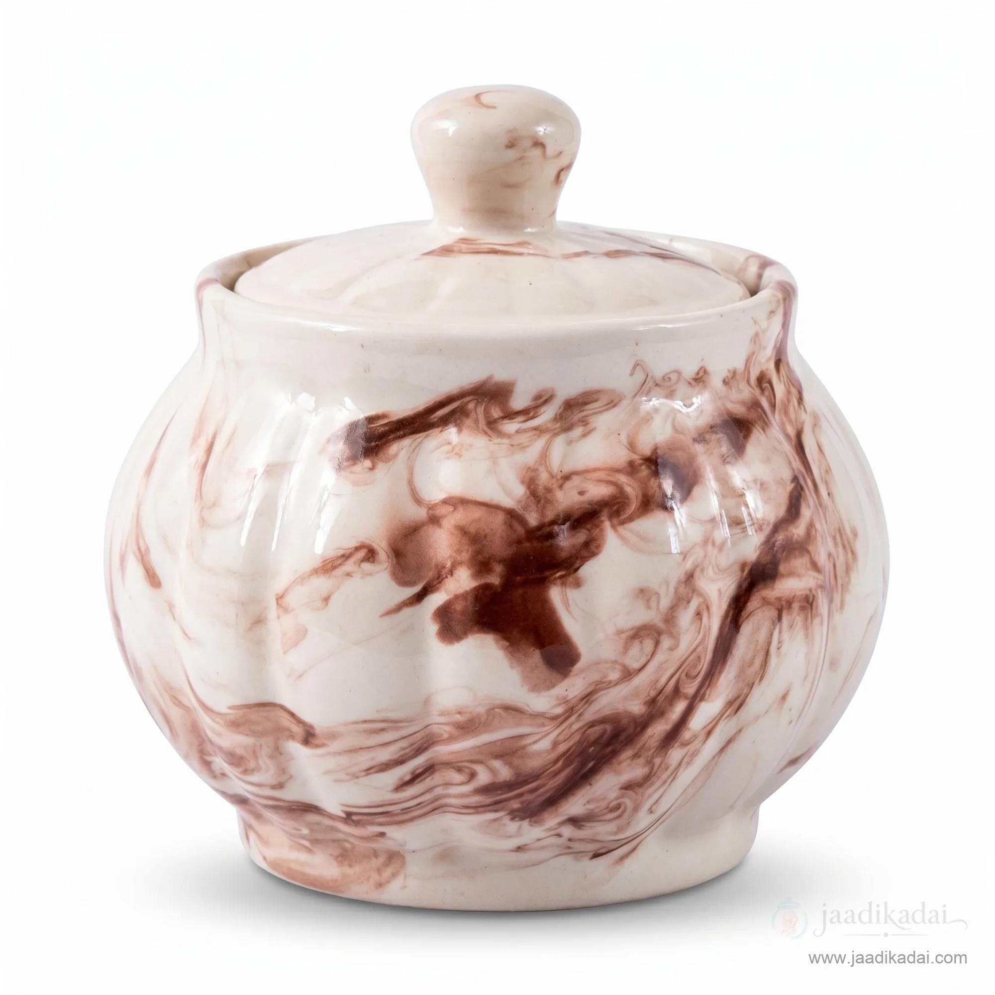 Round brown swirl ceramic storage pot with a matching lid on a clean white background.